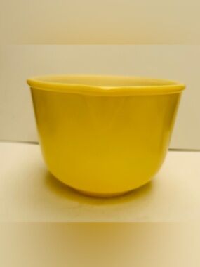Vintage Glasbake bowl by Sunbeam. Pale yellow color.